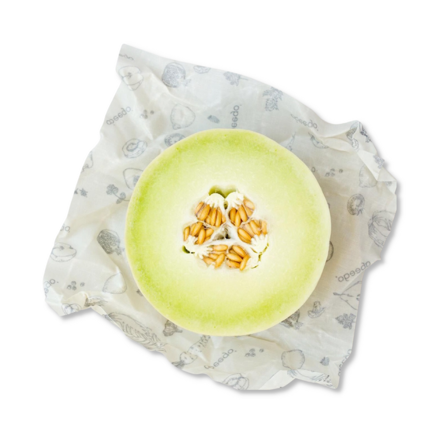 Abeego Reusable Beeswax Wrap, Shown with Green Melon. wraps medium