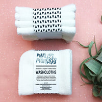 Marley's Monsters Bamboo Cotton Blend Washcloth 4 Pack With Plant, On Pink and White Background.