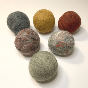 Bog Berry Wool Dryer Balls - Set of Six in Earthy Heathers, Shown on White Background.