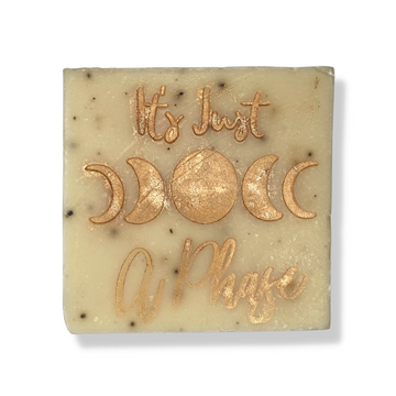 Luna Rosa Cinnamon Latte Soap Bar Stamped With Moon Phases And Words On White Background.